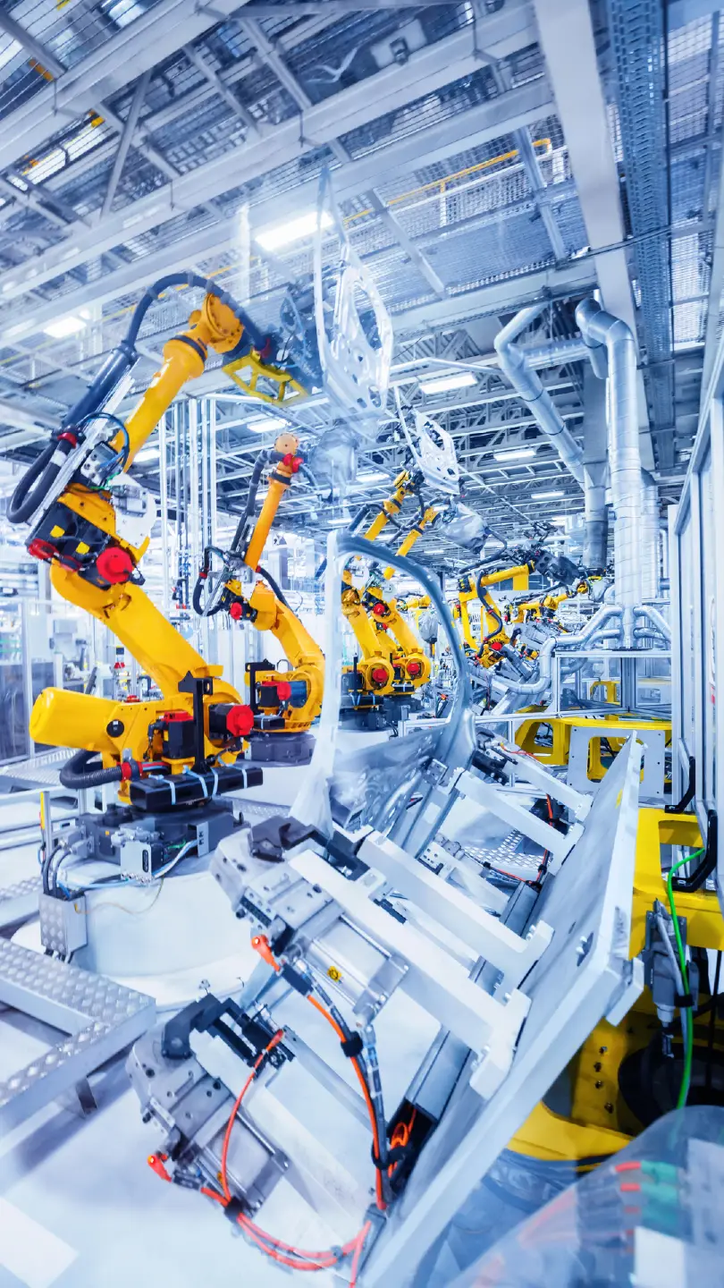 Planta industrial con maquinaria automatizada y sensores IoT